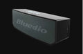 Black BS-6 cloud smart speaker with compact dimensions and micro-USB charging port