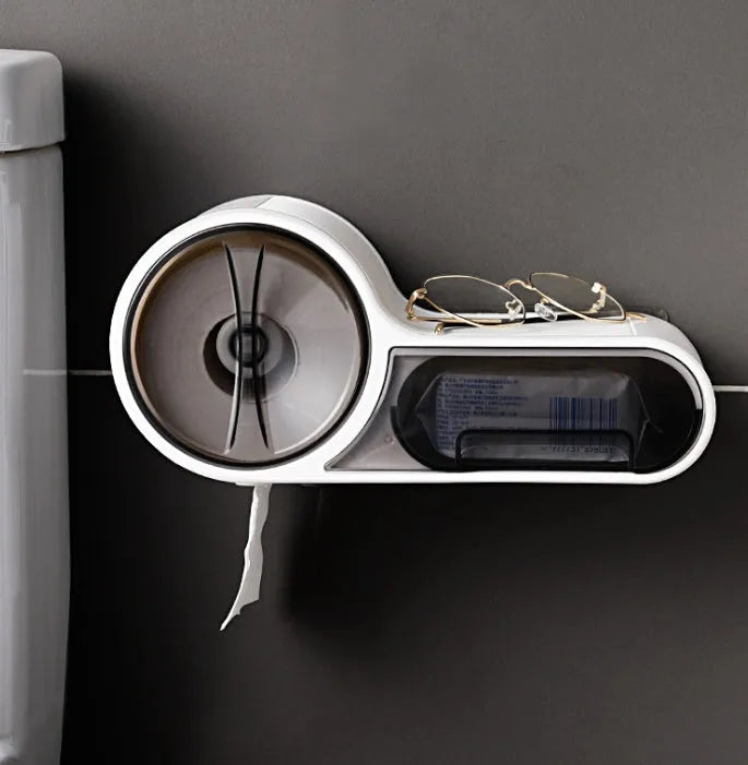 White plastic bathroom roll holder with streamlined curve design mounted on wall