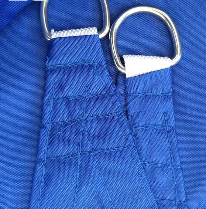 Curved square shade sail in blue colour providing outdoor UV protection