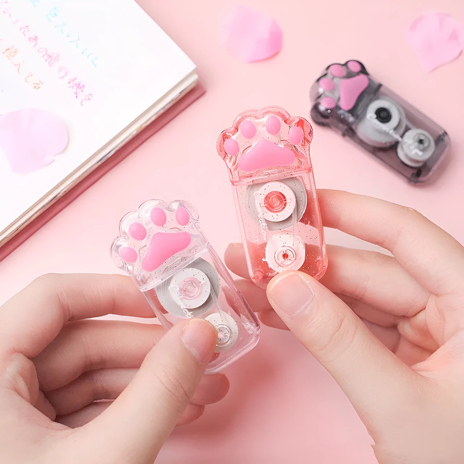 Cat claw correction tape dispenser with 5mm wide PET plastic tape in skyco cat claw bag packaging.