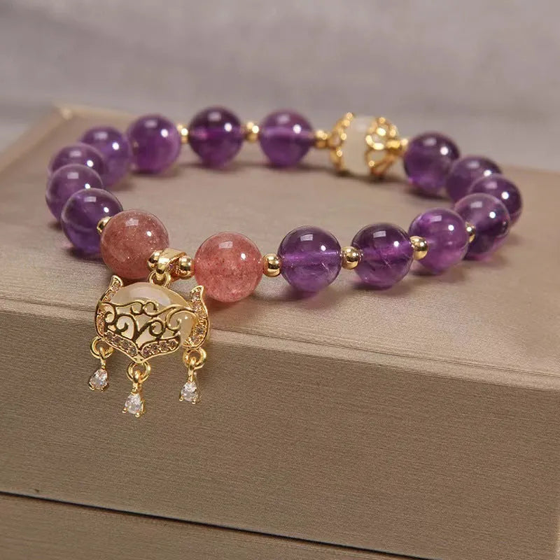 Handmade copper women's bracelet with natural amethyst stone in gold plated longevity lock pendant
