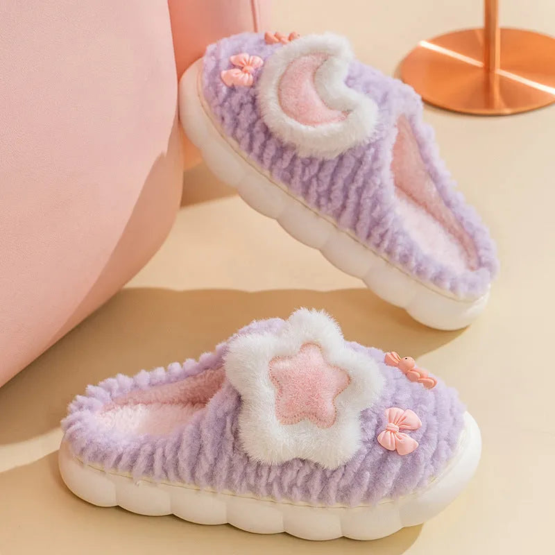 Light blue cartoon animal pattern women's fleece-lined slippers with round toe and PVC sole.