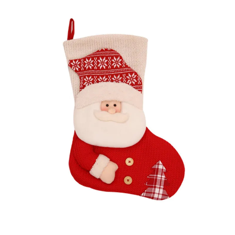 Large red and white knitted Christmas stocking with Santa Claus design for fireplace decoration