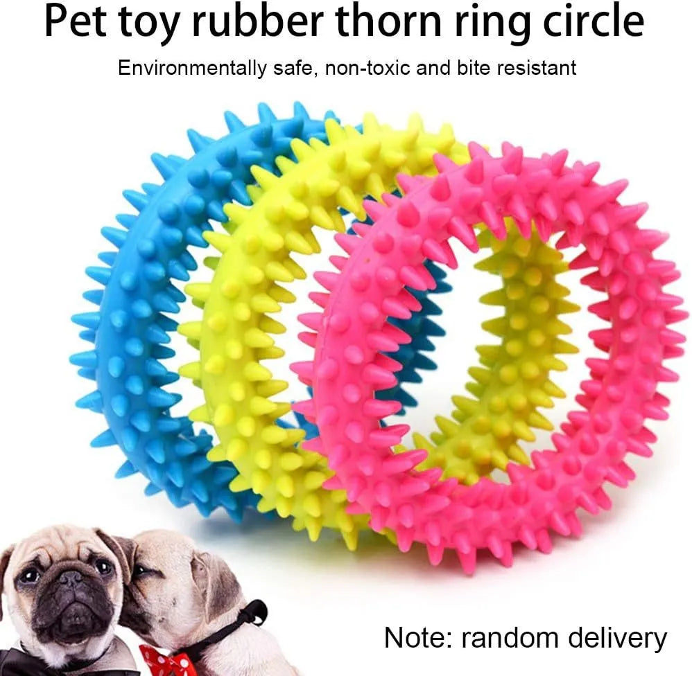 Blue TPR spiked ring dog chew toy for dental cleaning and bite training on a white background.