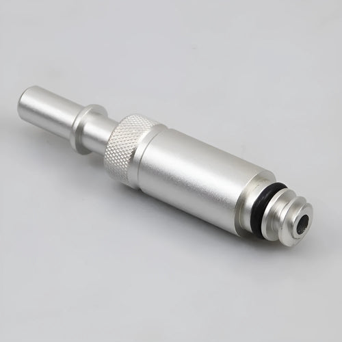 Silver metal VAS6262-9 transmission refuelling joint tool on a workshop bench.