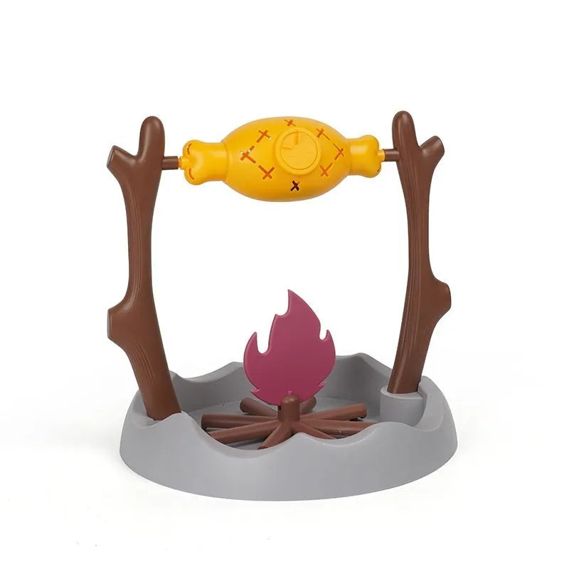 Barbecue-style plastic tumbling cat feeder toy for dispensing freeze-dried treats.