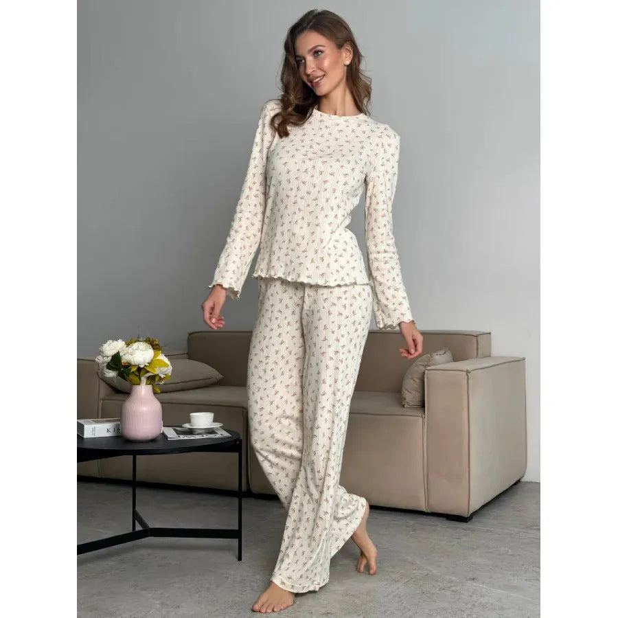 White floral print women's suit with long bell sleeve top and wide-leg trousers
