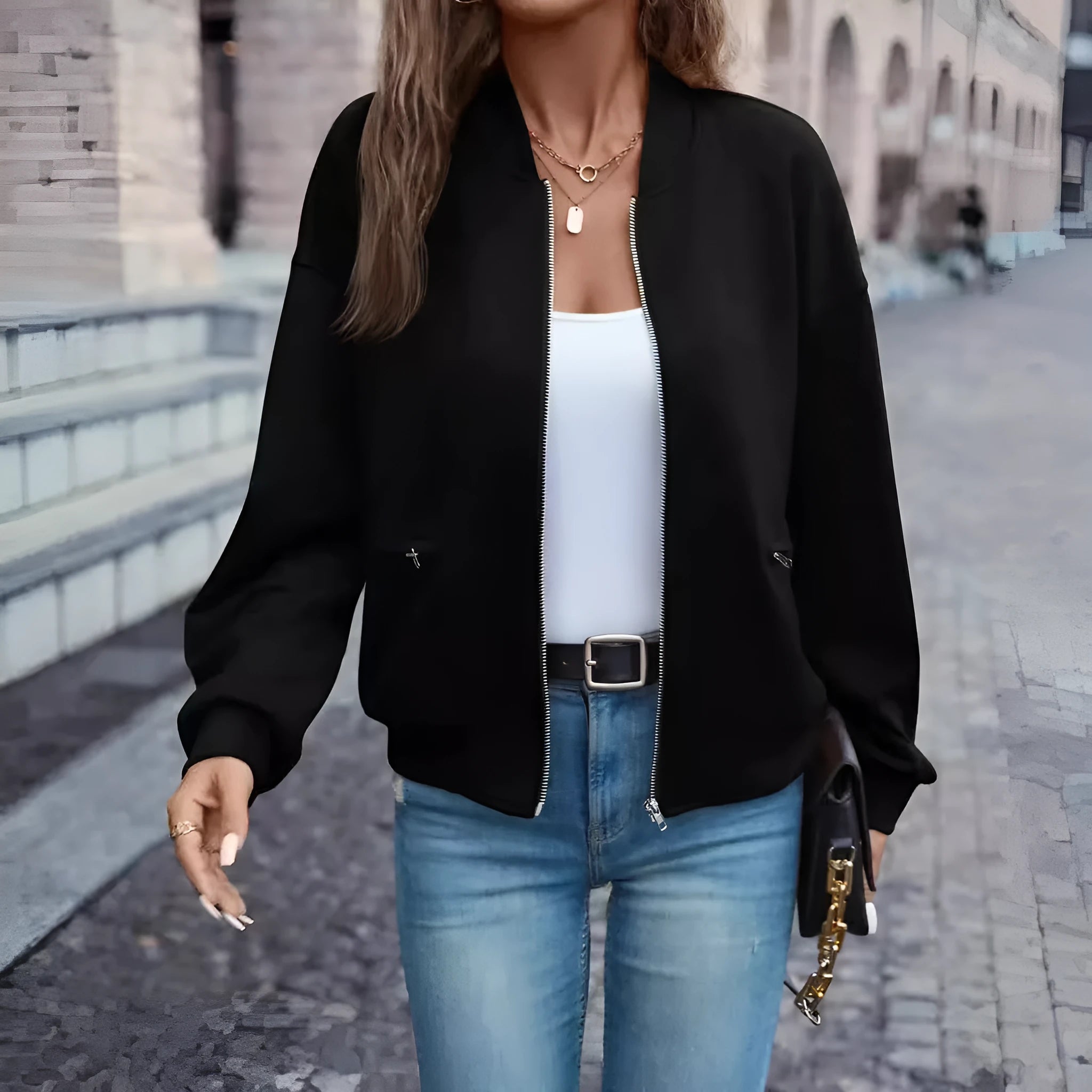 Black women's long sleeve zip jacket with faux pockets for casual autumn winter wear.