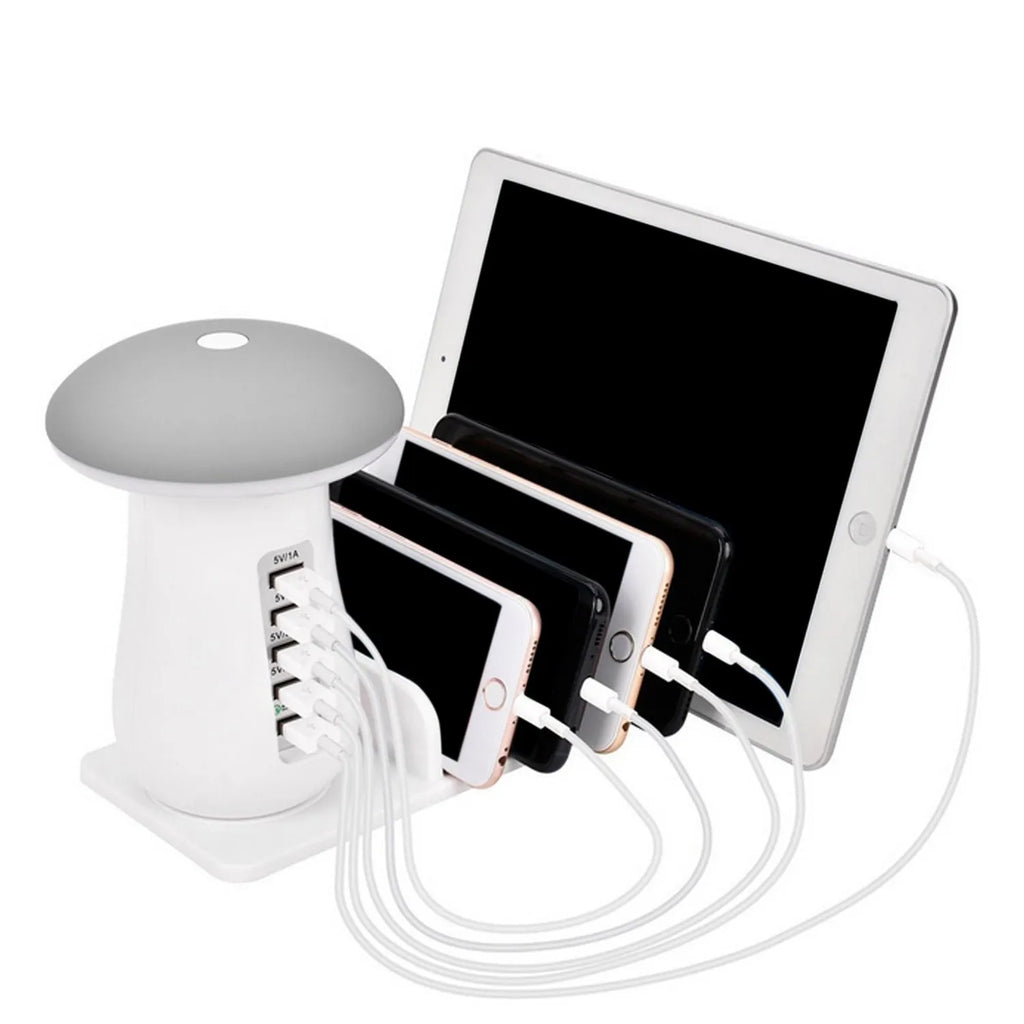 White mushroom-shaped USB charging dock station with five ports and integrated LED night light on a desk.
