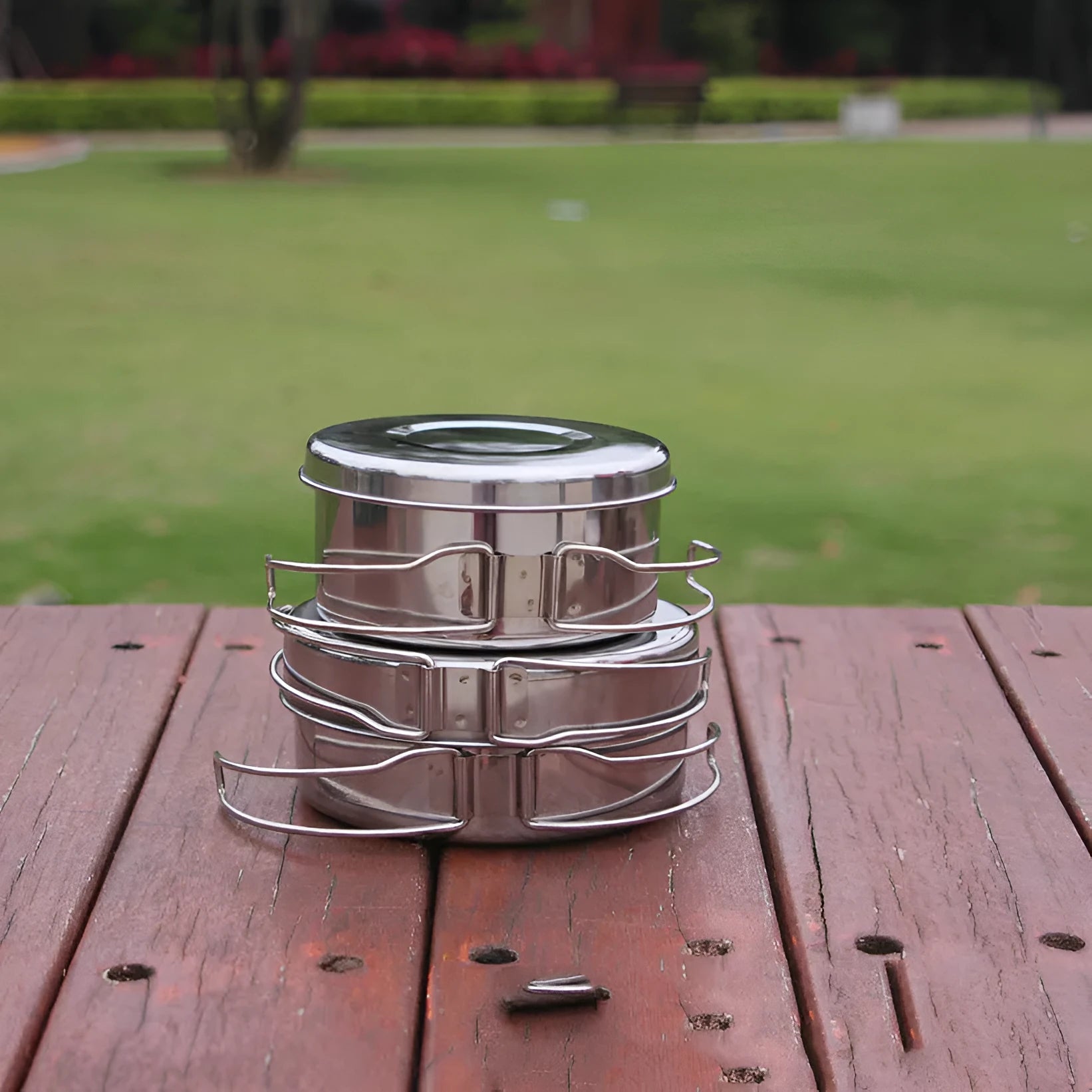 Silver stainless steel camping cookware pot set with 4-piece round design for 2-3 people