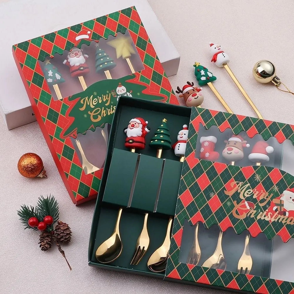Red stainless steel Christmas spoon and fork set with snowman and Christmas tree designs