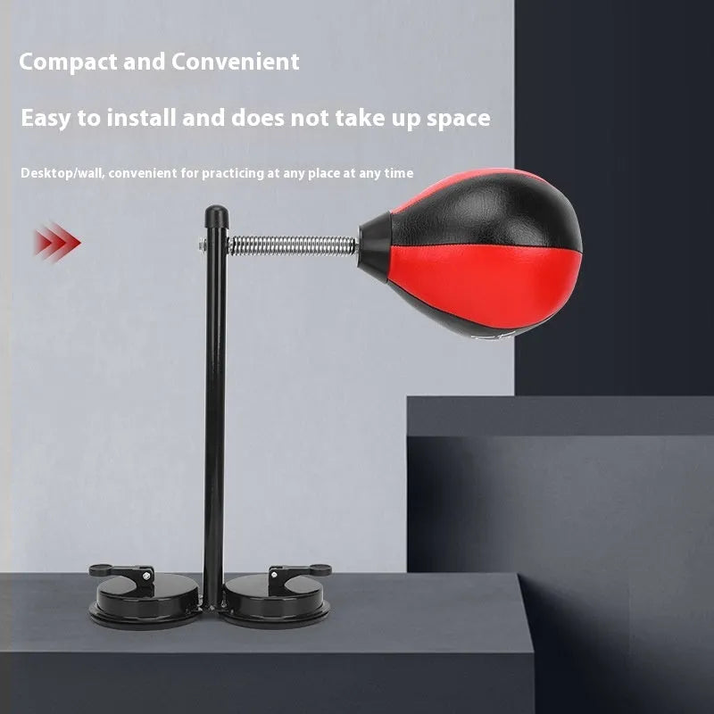 Red and black pear-shaped PU hanging speed ball with elastic band and suction cup mount for boxing training.