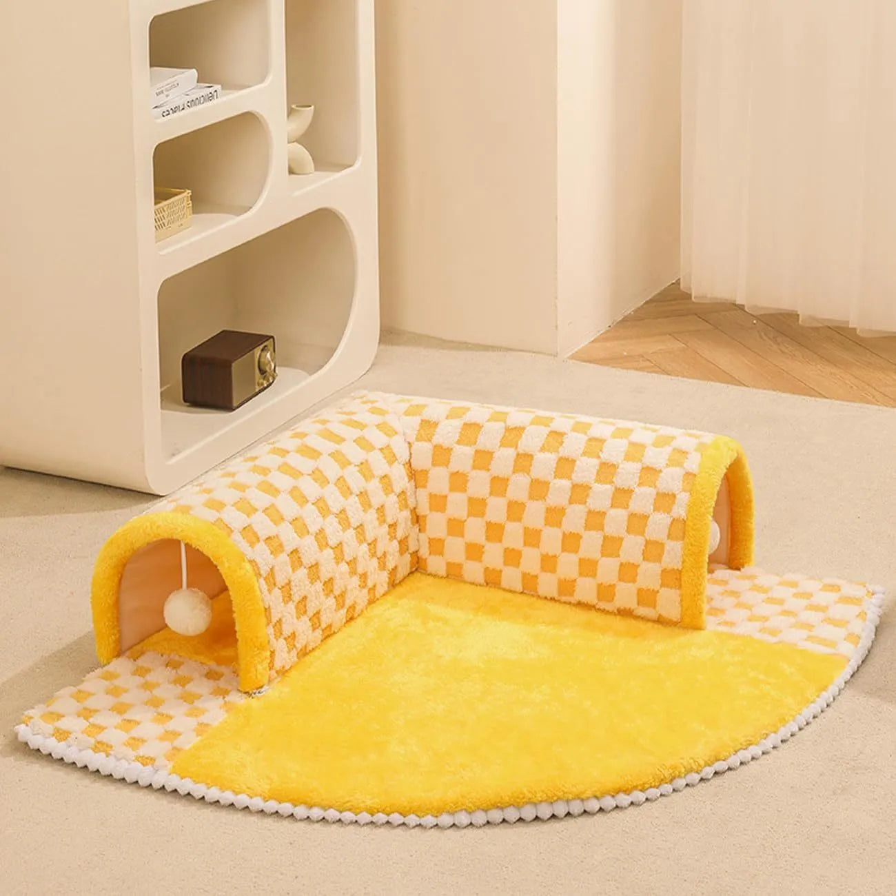 Coffee coloured plush 2-in-1 pet bed with a sleeping mat and an attached tunnel, showing anti-slip base.