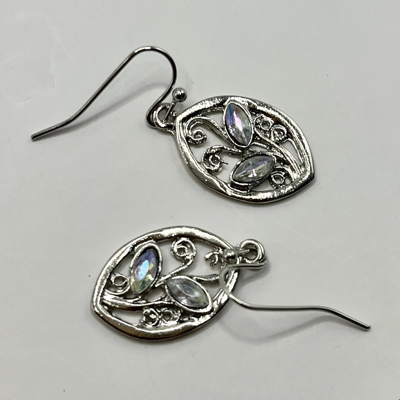 Women's silver alloy leaf earrings with embedded colourful moonstone and diamond treatment
