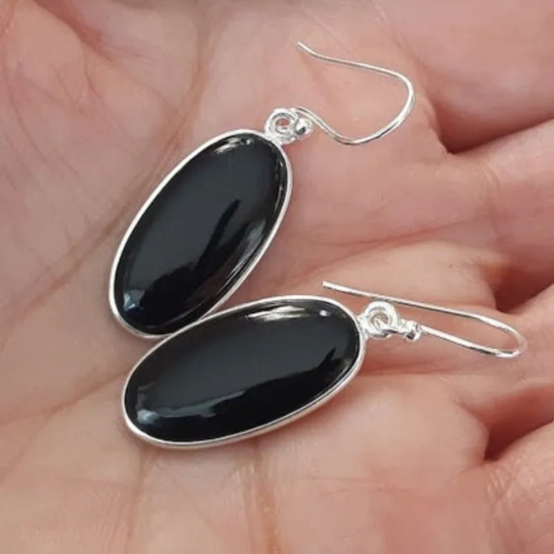 Women's fusion style earrings with oval black agate pendant in electroplated 925 silver geometric setting