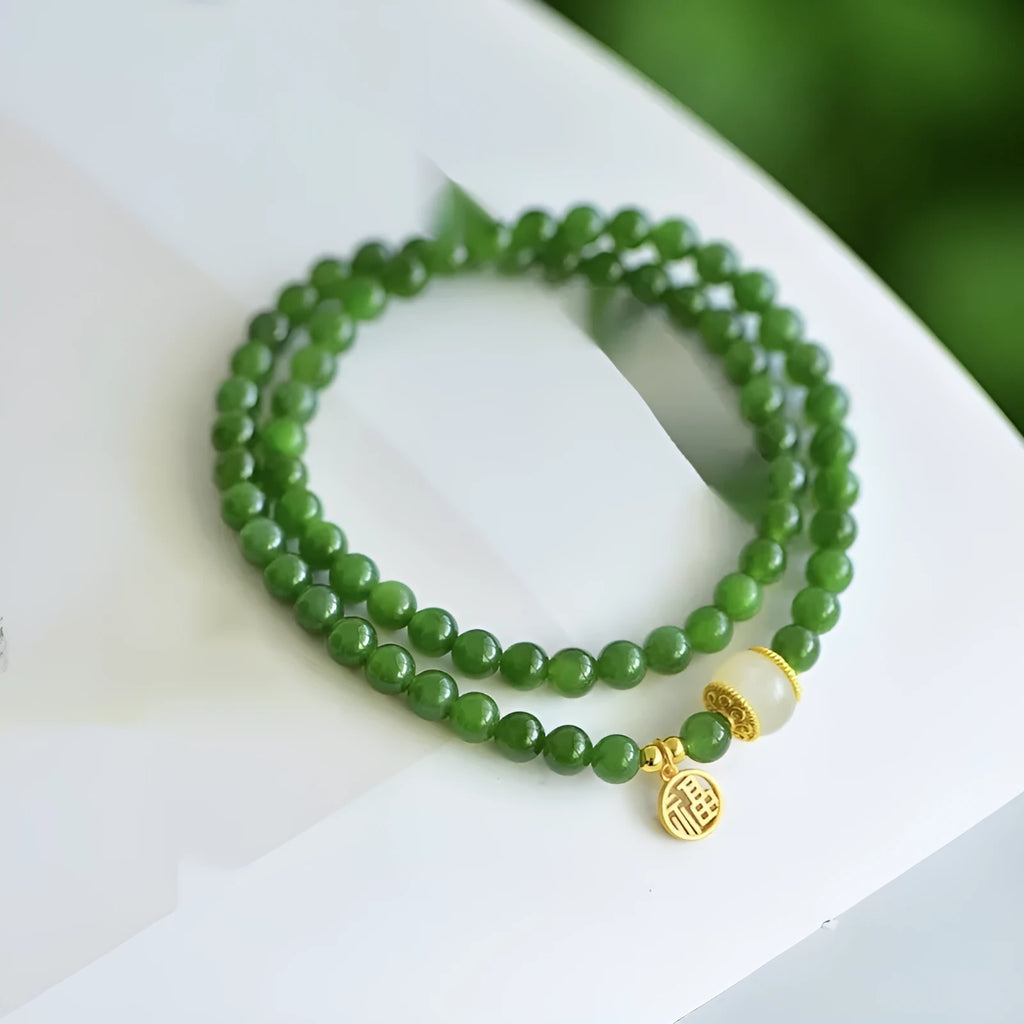 Women's double circle Hetian jade bracelet with engraved fu character in geometric design