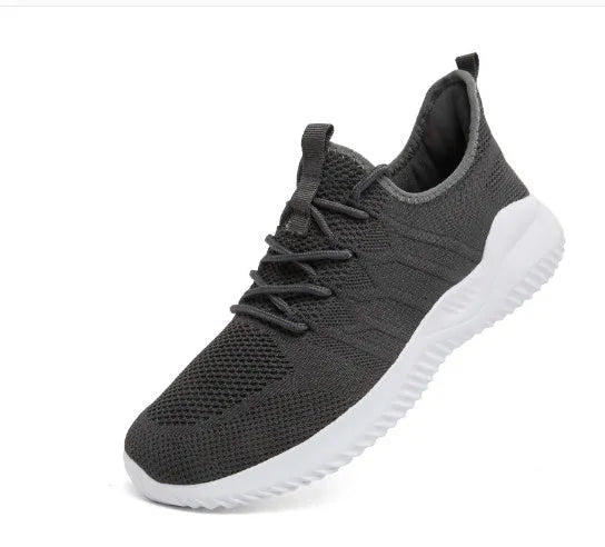 Men's black and white mesh lace-up sneakers with round toe and PVC sole.