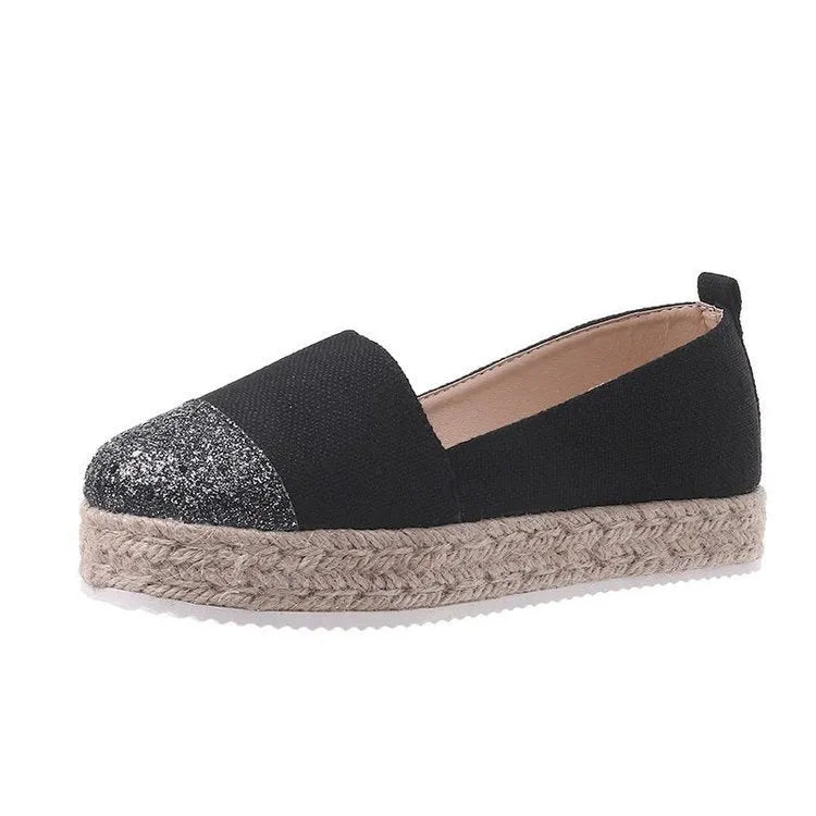 Plus size canvas oversleeve shoes in black and beige colours showing round toe design