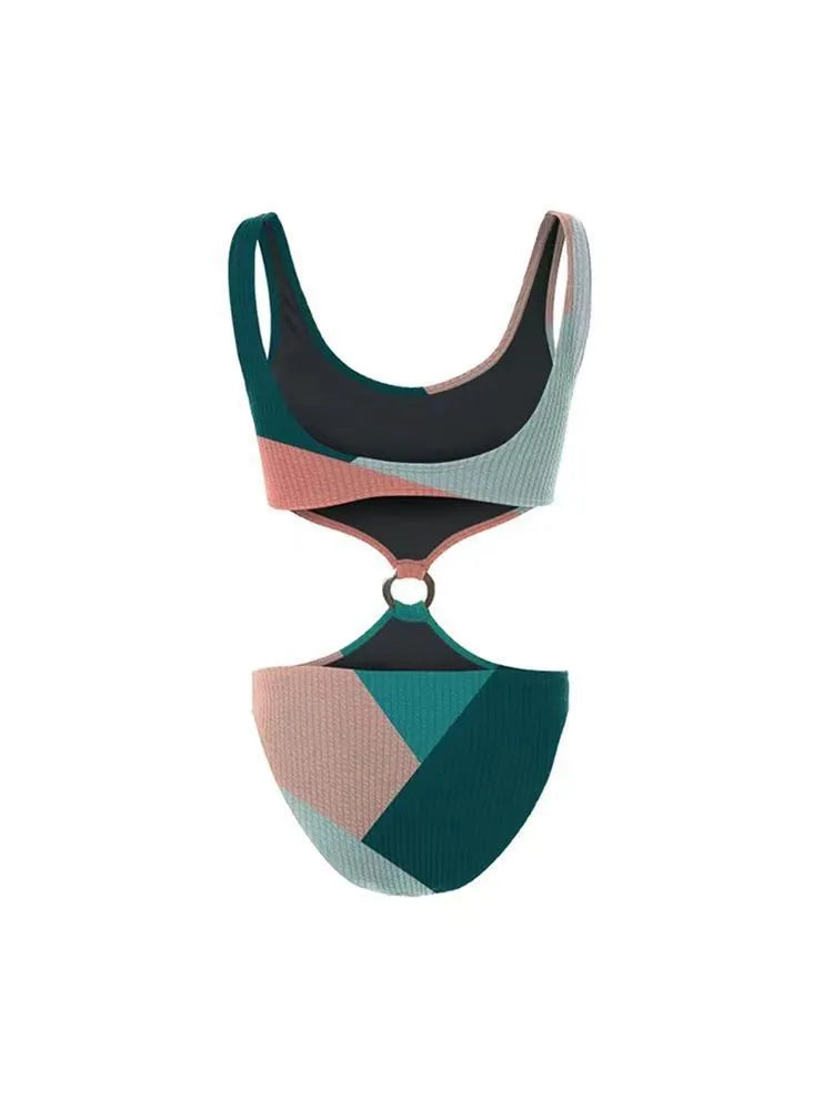 Contrast colour bikini two-piece set with a light mesh gauze skirt laid flat.