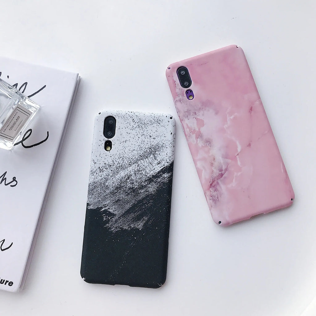 Black painted polycarbonate back cover case for a Huawei smartphone on a white background.