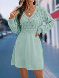 Women's apricot V-neck long sleeve beach dress with a 3D pattern and high waist.