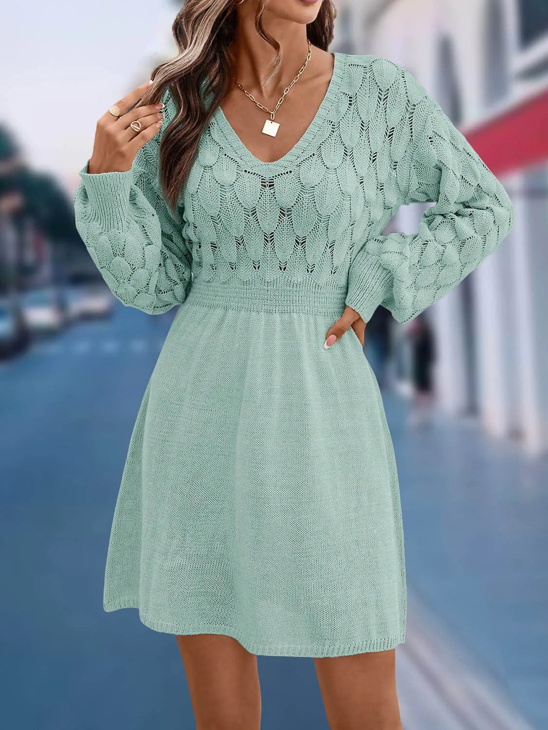 Women's apricot V-neck long sleeve beach dress with a 3D pattern and high waist.