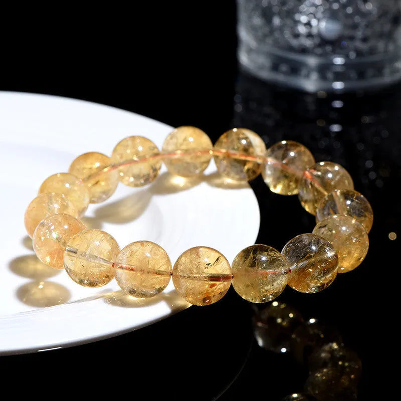 Natural yellow Asestelle citrine bracelet with geometric beads in multiple sizes