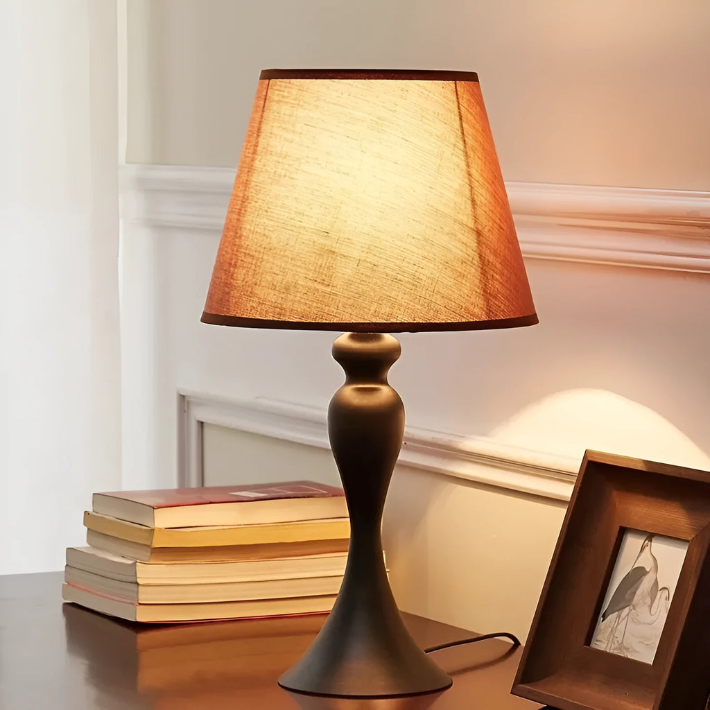 Retro American style alloy bedside lamp with LED lighting on wooden table