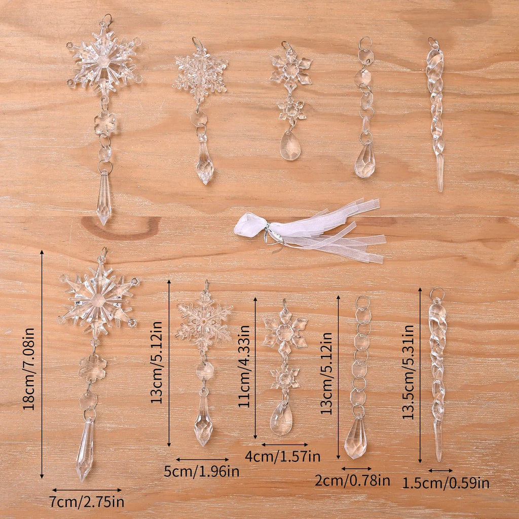 Set of ten clear acrylic icicle and snowflake Christmas ornaments with white hanging ribbons.