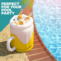 Large yellow inflatable beer mug drink cooler floating in a swimming pool.