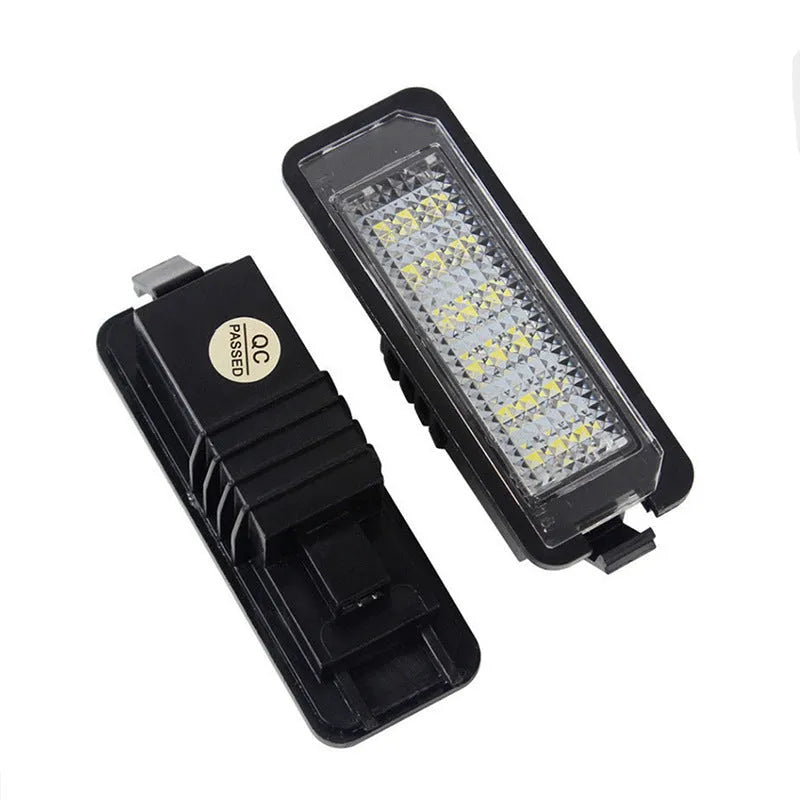 Two white LED licence plate light bulbs for Volkswagen Golf, Polo, and Phaeton models.