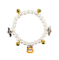 Simulated pearl Halloween cat collar with a choice of purple ghost, skull, or smiling pumpkin charm.
