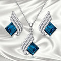 Women's alloy necklace and earring set with glass pendant in European style