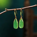 Chinese style geometric earrings in jade colour with water droplet design on copper base with electroplated finish