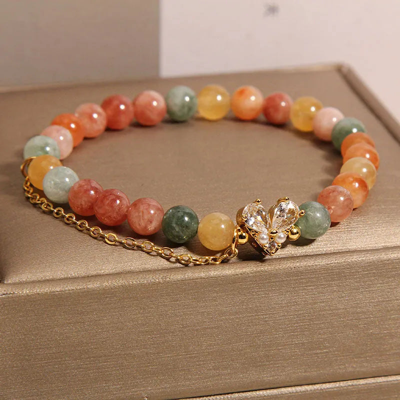 Fu Lu Shou crystal bracelet for women with gold tone metal settings and V-shaped zircon design