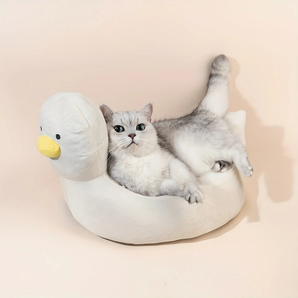 Blue duck-shaped pet bed sofa with soft polyester filling and raised edges