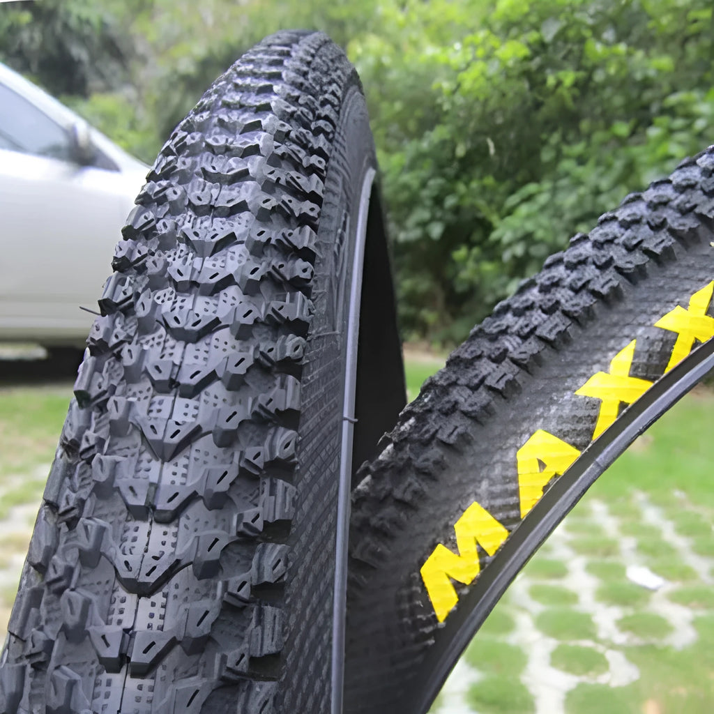 Mountain bike ultralight puncture-resistant tyre showing tread pattern and sidewall with size options