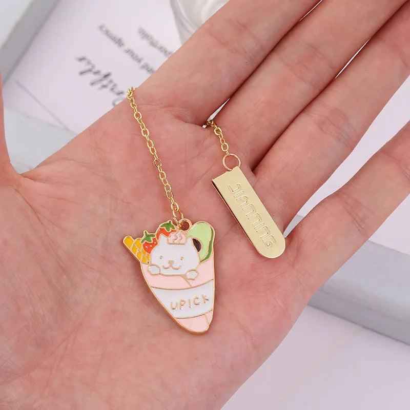 Jane Key Foodie Cat metal bookmark with cartoon cat design on laminated card.
