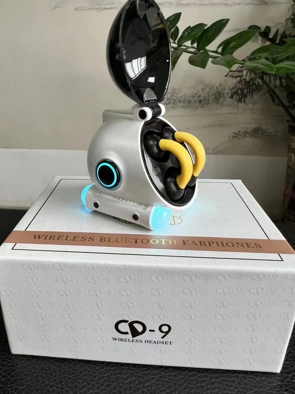 Clip-on wireless Bluetooth sports headset in black showing attachment mechanism and compact design