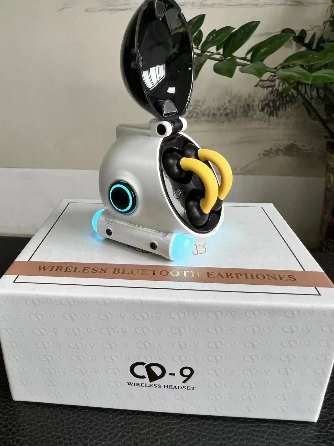Clip-on wireless Bluetooth sports headset in black showing attachment mechanism and compact design