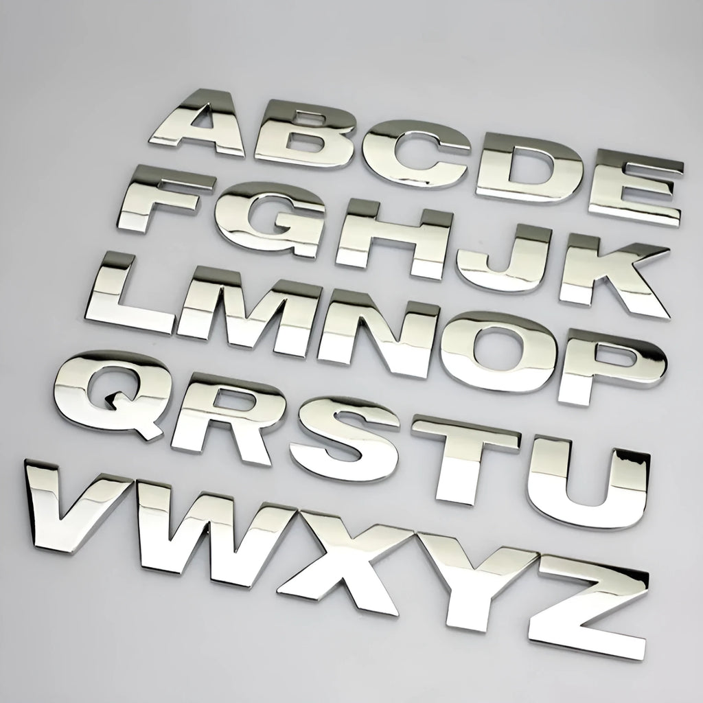 Zinc alloy 3D raised letter car sticker for bumper customisation in black or silver.