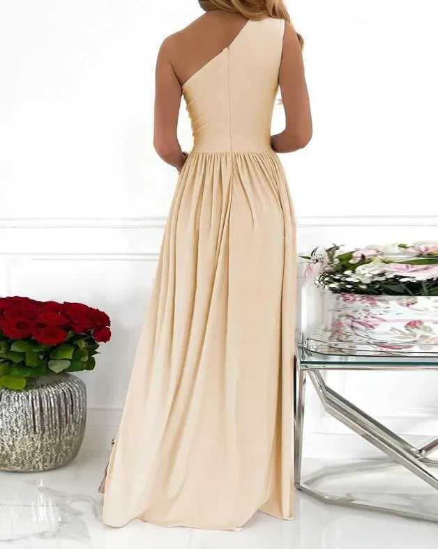 Women's apricot one shoulder maxi dress with high leg split and cutout detail.