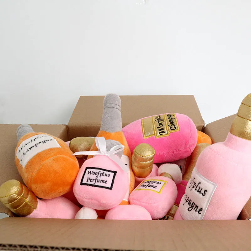 Plush wine bottle shaped dog toy in assorted colours with soft textile material