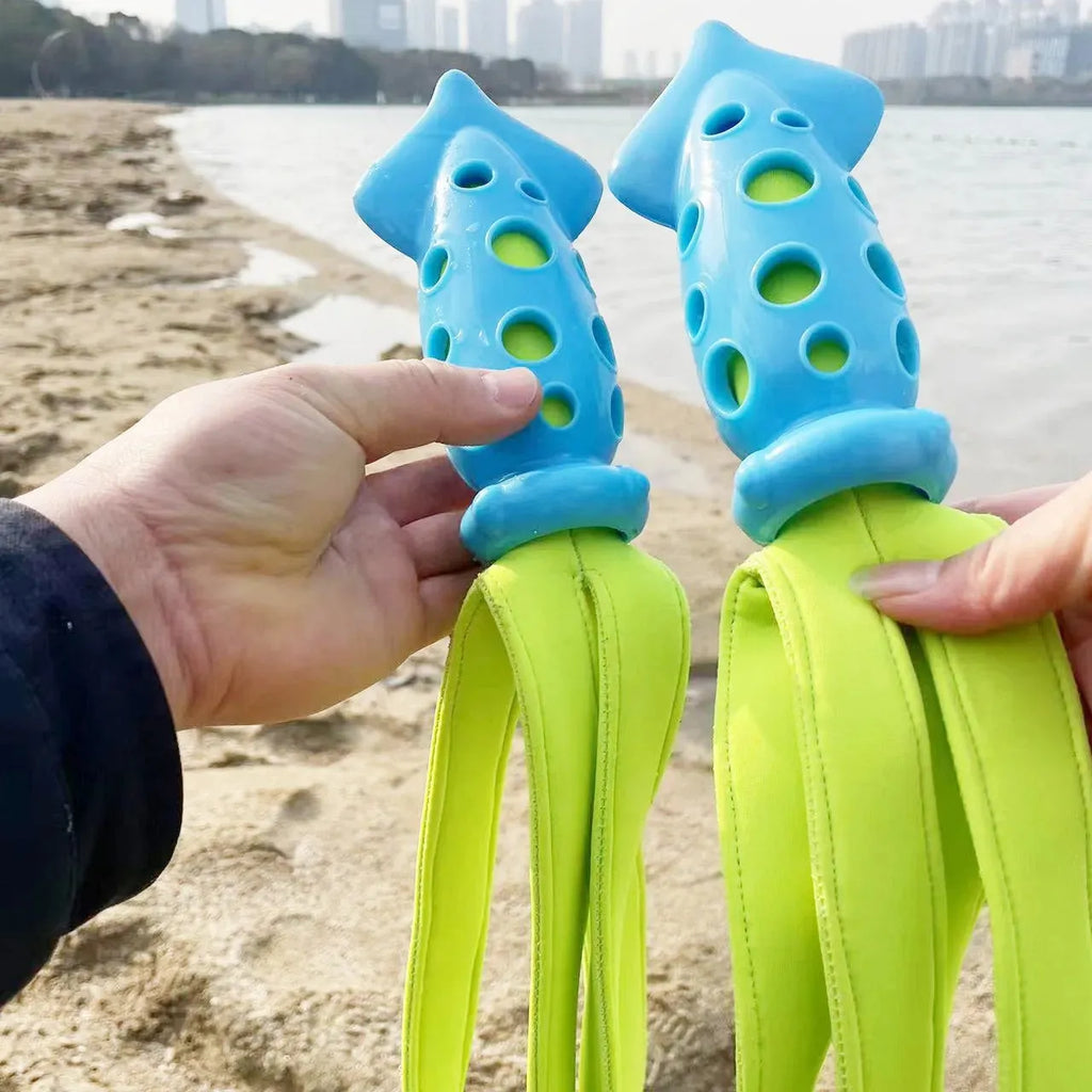 Blue cuttlefish-shaped squeaky dog chew toy, approximately 39cm long, made from rubber and cloth.