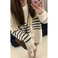 Japanese Korean style cardigan sweater with 3D pattern and button collar on a hanger.