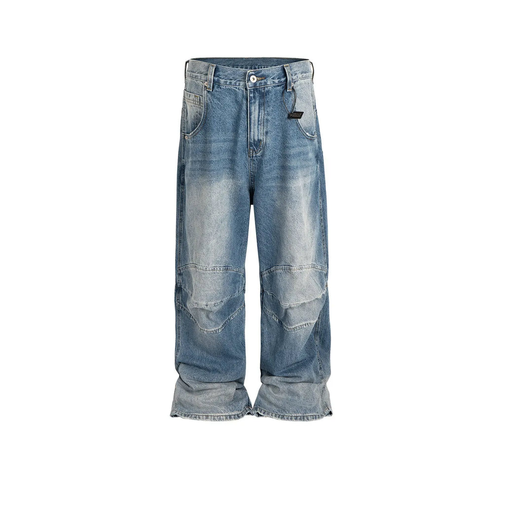 Baggy washed blue straight-leg jeans with zip fly on mannequin