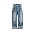 Baggy washed blue straight-leg jeans with zip fly on mannequin