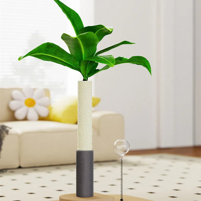A wooden vertical cat scratching post in canna colour with a chamfered column and a food drop ball attached.