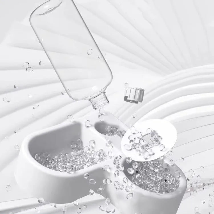 White pet water fountain for cats and dogs with stainless steel drinking top.