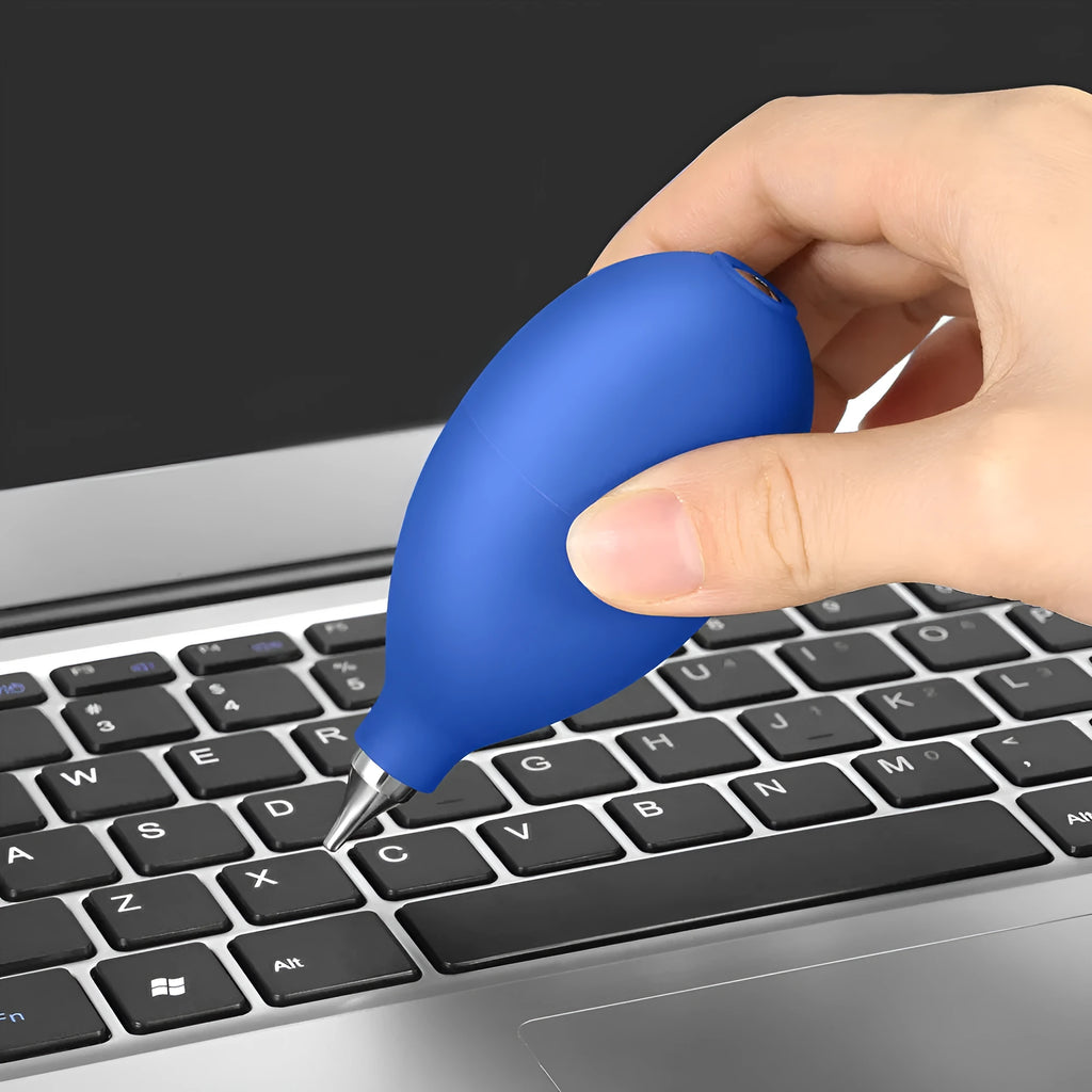 Blue rubber dust removal air blower tool for cleaning cameras and phones.